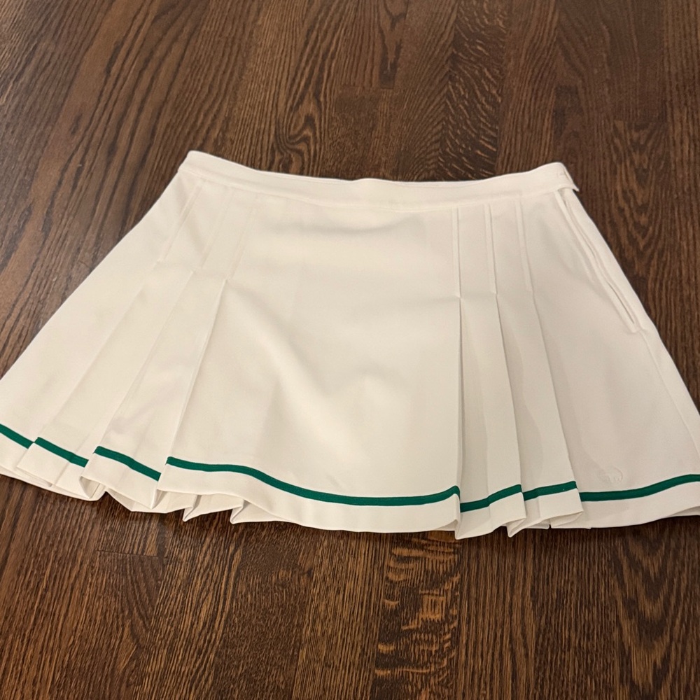 White Pleated Tennis Skirt with Green Trim